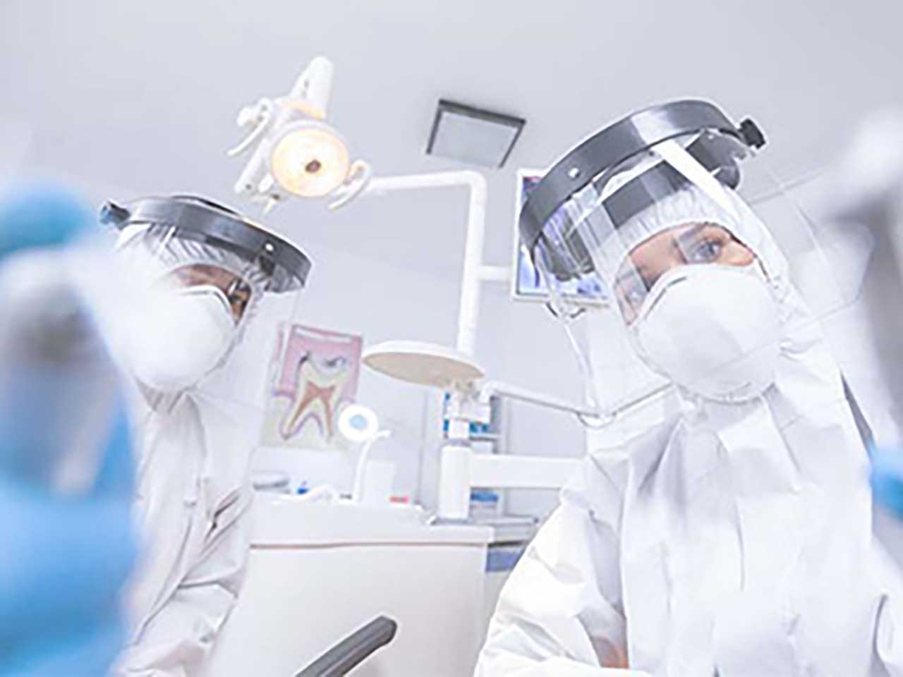 dental professionals wearing PPE