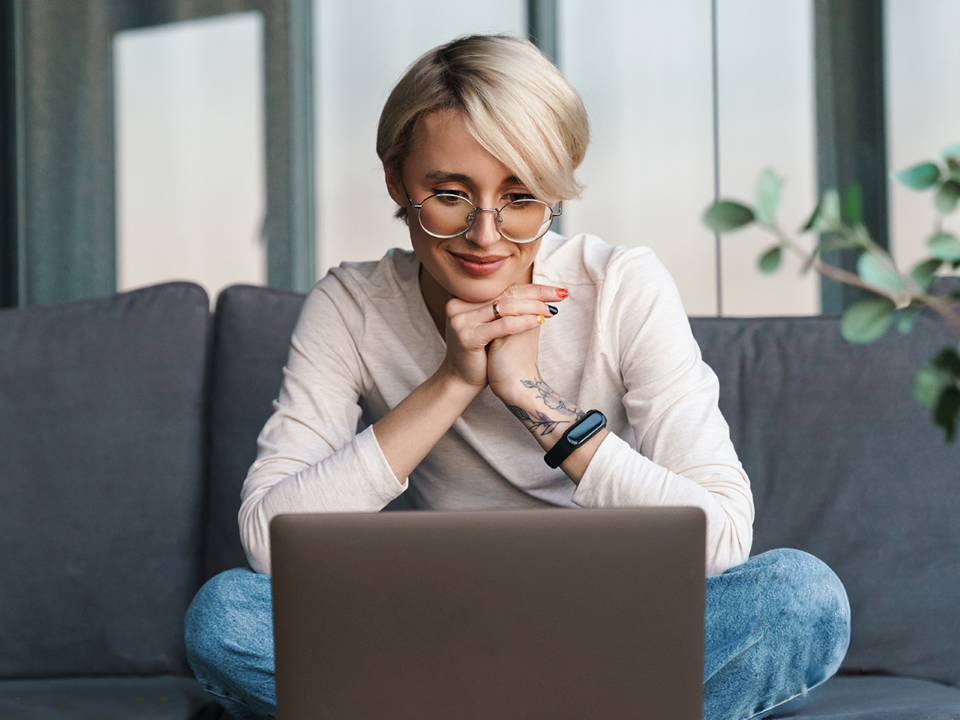 Woman sitting at laptop