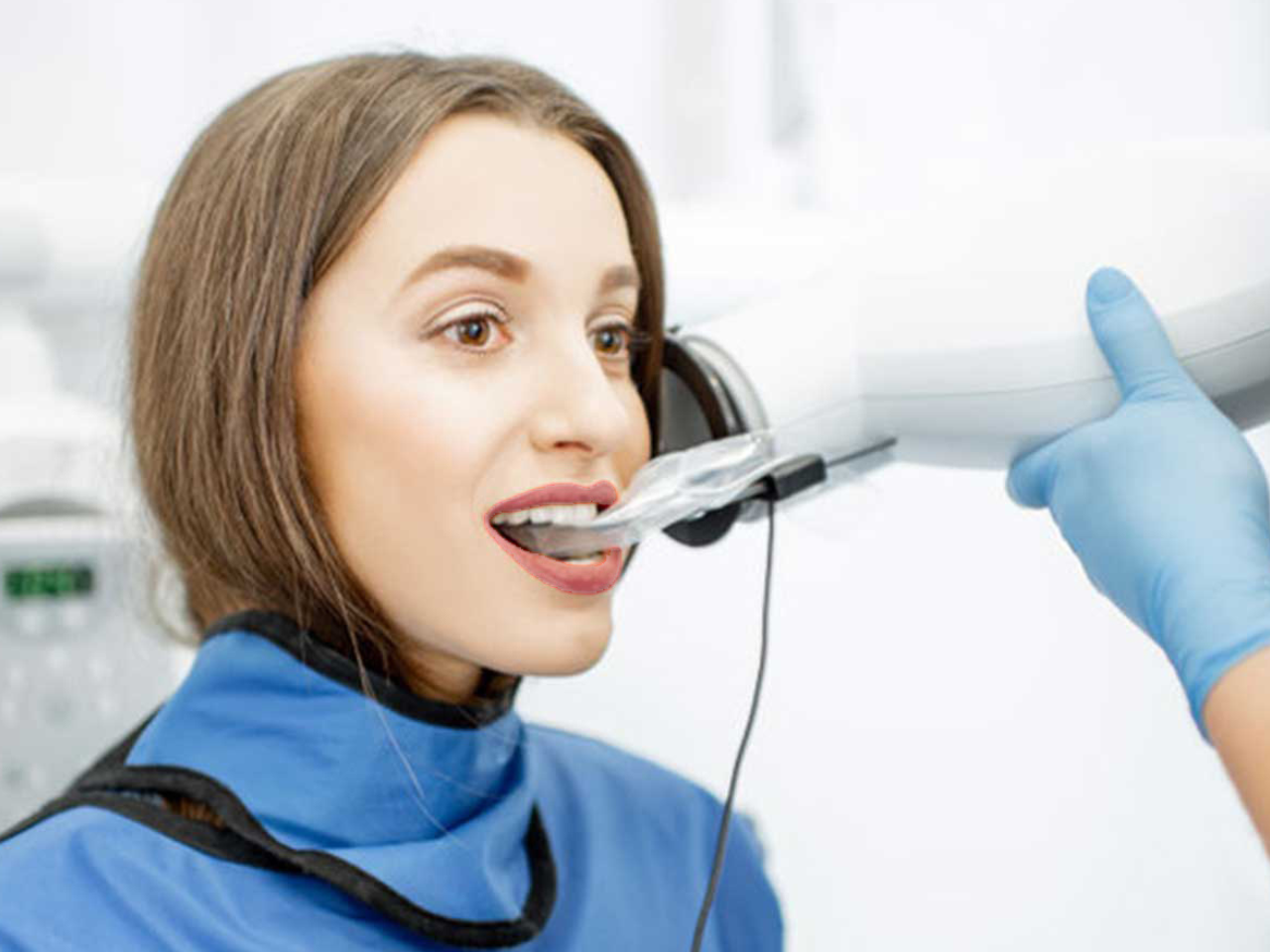 female patient having digital dental radiographs