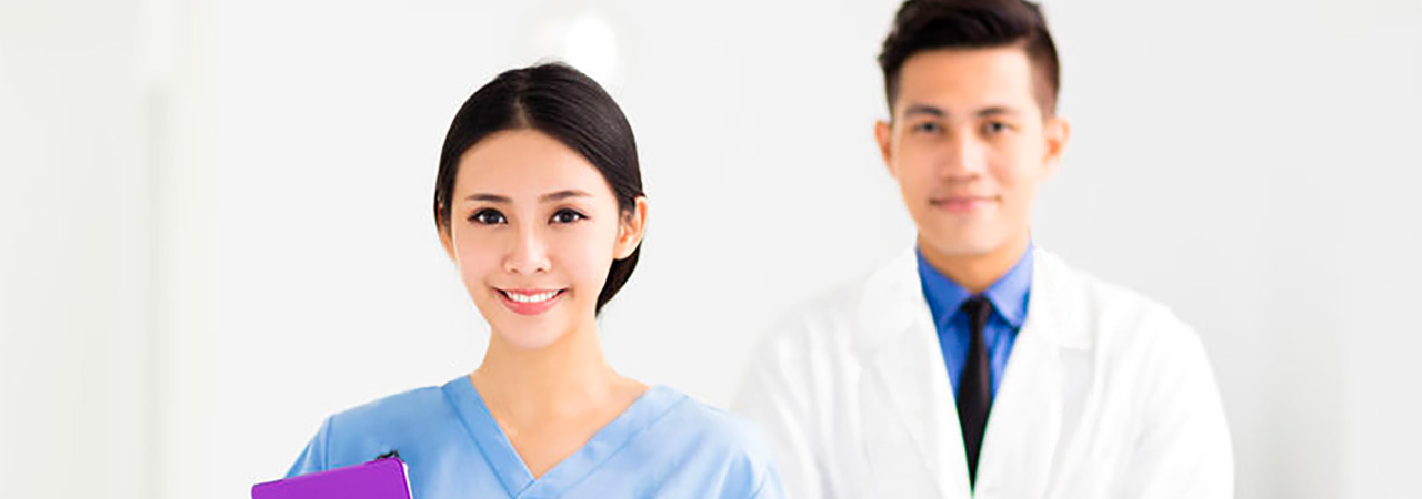 Female and male dental professionals