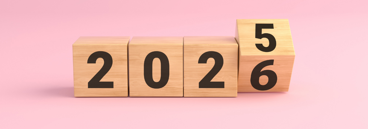 wooden numbered blocks that say "2025" with the last block turning over to reveal 6