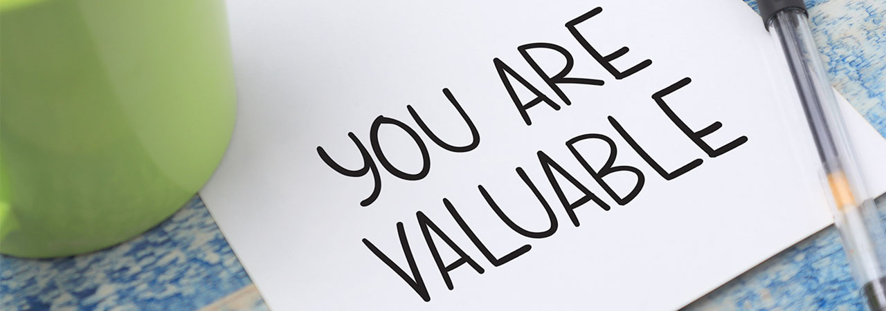 a sign reading "you are valuable"
