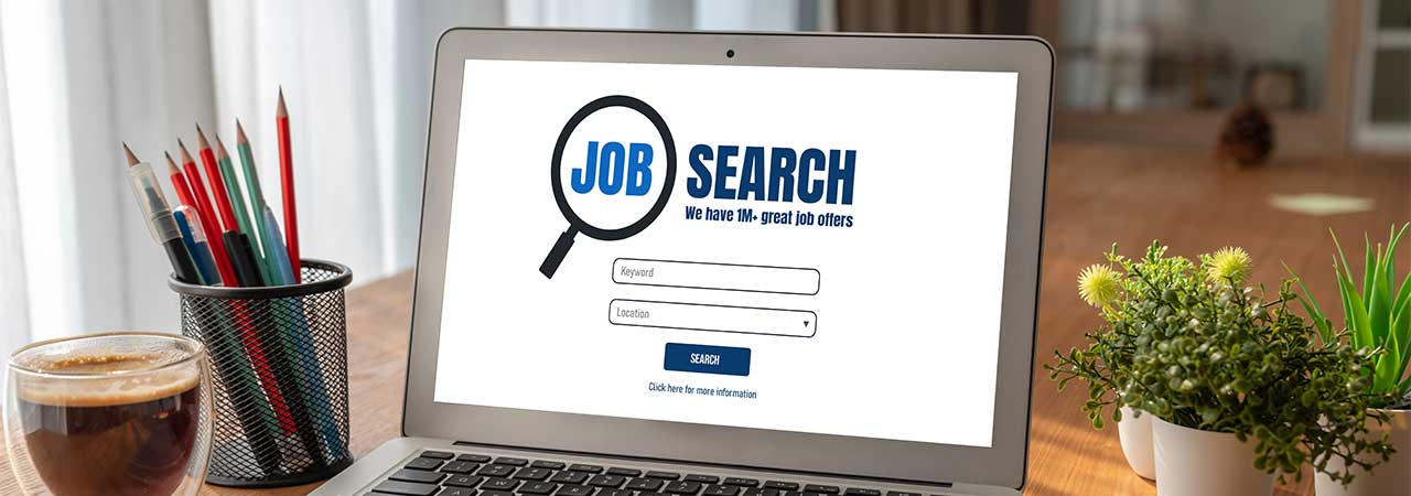 a laptop with the screen displaying a job search board