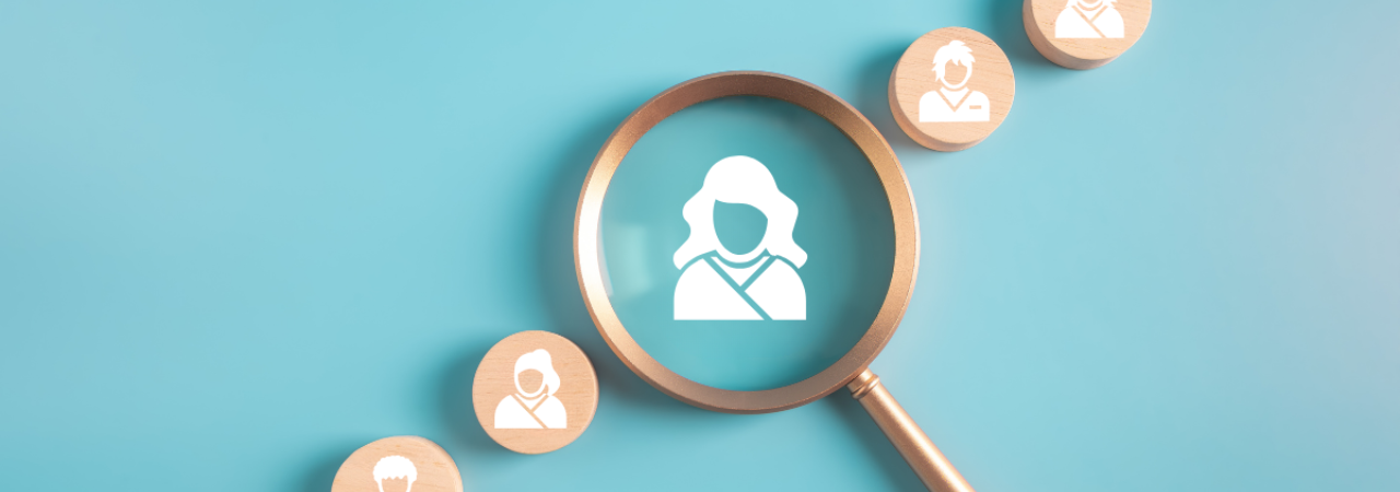 Diagonal line of dental assistant icons with a magnifying glass on the middle icon against a blue background