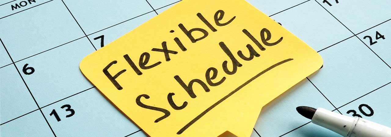 a calendar with a post-it note that says "flexible schedule"