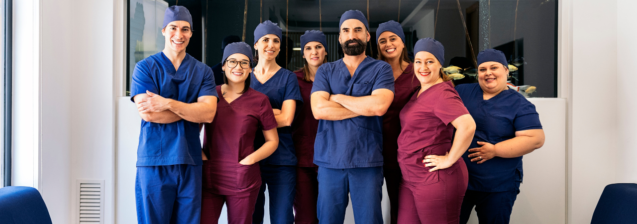 dental staff poses for photo
