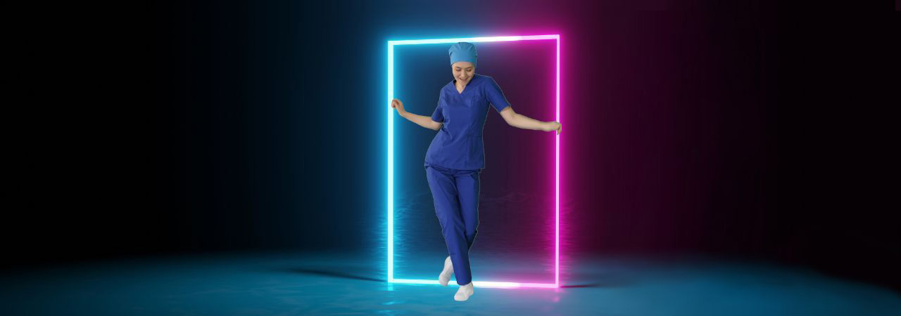 dental assistant dances in front of neon frame