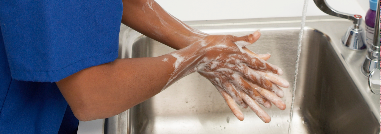 dental assistant washing hands