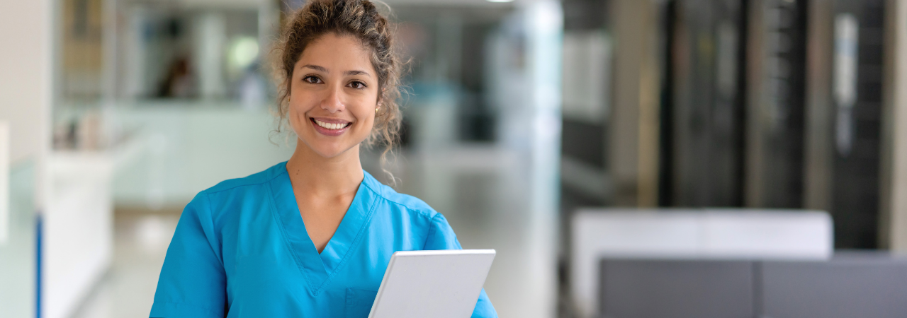 dental assistant holding a chart