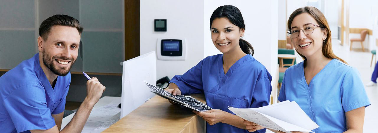 dental staff at reception desk