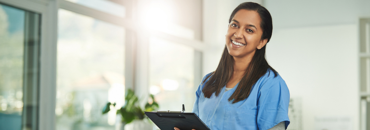 Smiling dental assistant