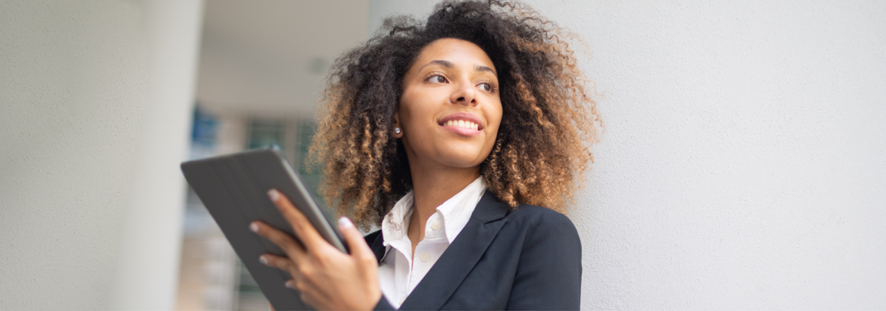 Smiling professional woman with tablet