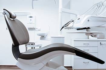 gray dental chair in treatment room